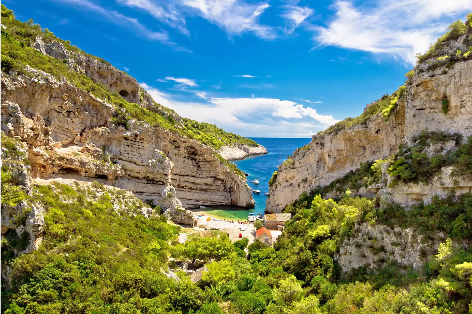 Traditional fishing boats in the harbor of Komiža, Vis island