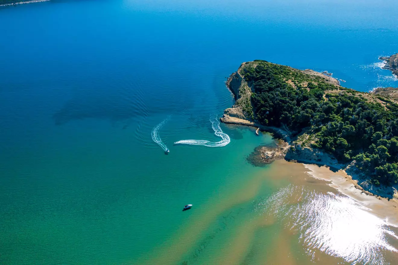 Sailing yacht approaching the historic town of Rab, a highlight of sailing in Croatia
